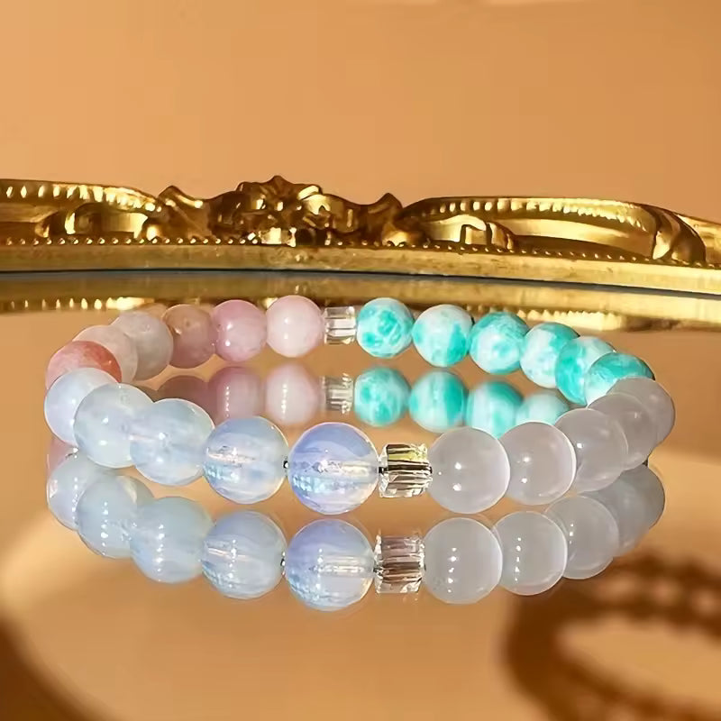 Women's healing energy bracelet with a variety of natural stones, opal, ocean stone, pink quartz, moonstone