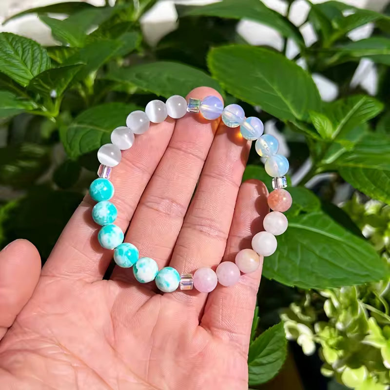 Women's healing energy bracelet with a variety of natural stones, opal, ocean stone, pink quartz, moonstone