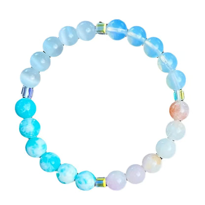 Women's healing energy bracelet with a variety of natural stones, opal, ocean stone, pink quartz, moonstone