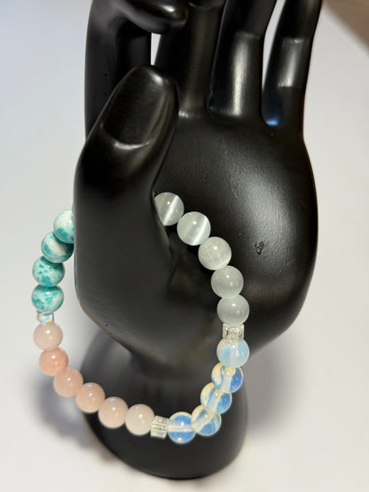 Women's healing energy bracelet with a variety of natural stones, opal, ocean stone, pink quartz, moonstone